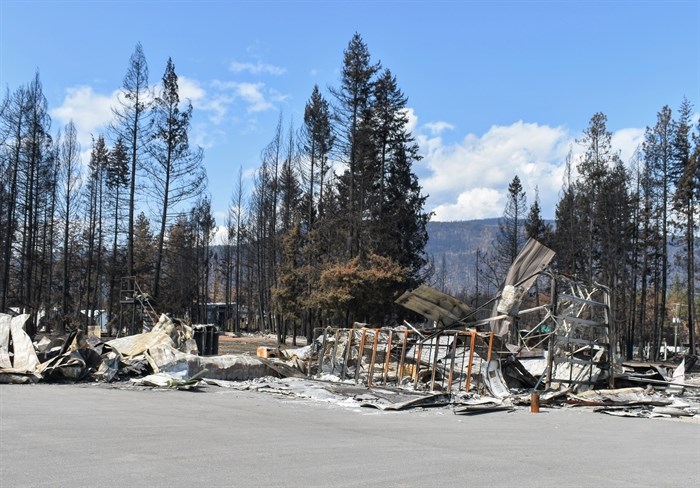 The Scotch Creek fire hall is barely recognizable as little but a charred overhead door and a staircase remain standing. 