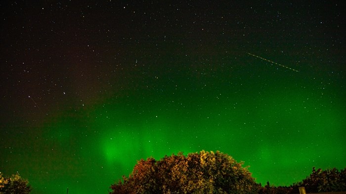 Northern lights over Cherry Creek showing Starlink satellite. 