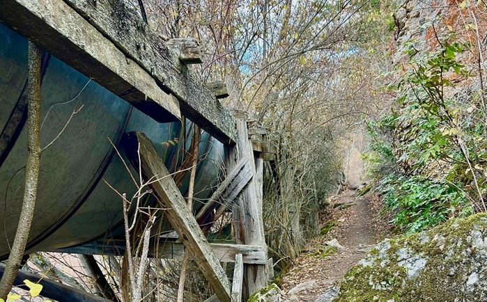 Bits and pieces of a metal and wood irrigation flume can be seen on The Grey Canal trail system in Vernon.  