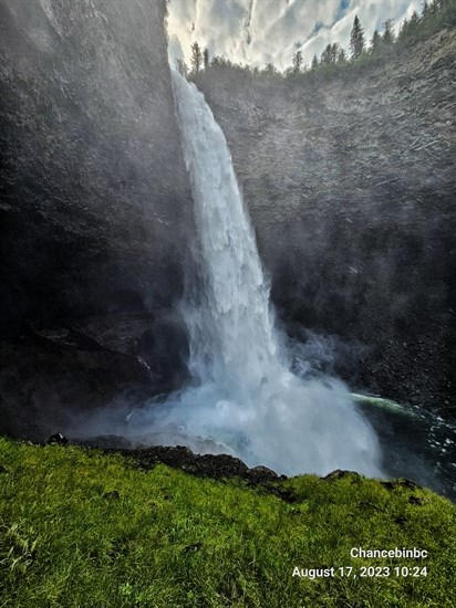 Helmcken Falls falls and green grass captured in August by Vernon adventurer Chance Breckenridge. 