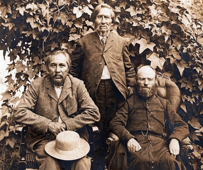 This 1904 photograph is of Chief Louis Clexlixgen of Kamloops, Johnnie Chilleheetsa of Douglas Lake and Father Le Jeune, an Oblate priest. 