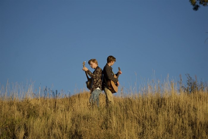 Promotional photography for Kelowna folk rock duo 70X7.