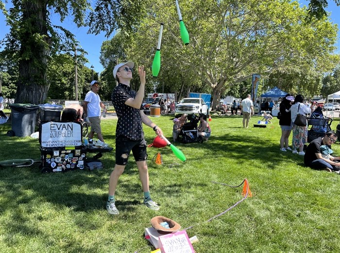 Evan the Juggler showing off his moves at the festival. 
