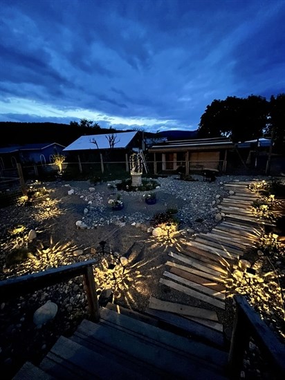 Solar powered lights shine in a Heffley Creek garden. 