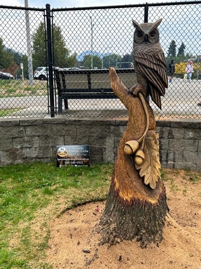 This carved artwork by Kamron Garbe is located in Lombardy Park in Kelowna. 