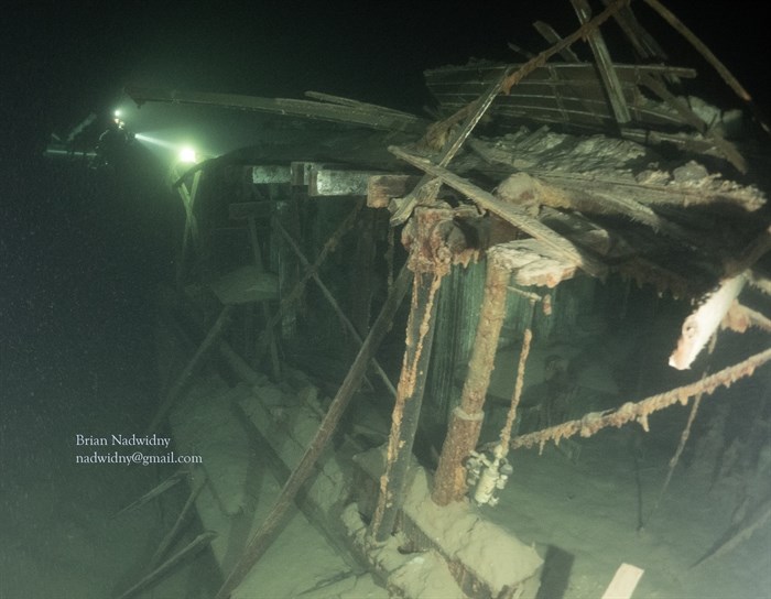 Brian Nadwidny's diving light illuminates the remnants of the S.S. City of Ainsworth. 