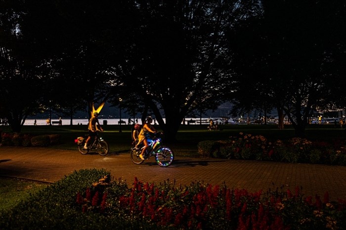 Residents cycle through Kelowna City Park during the Labour Day long weekend. 