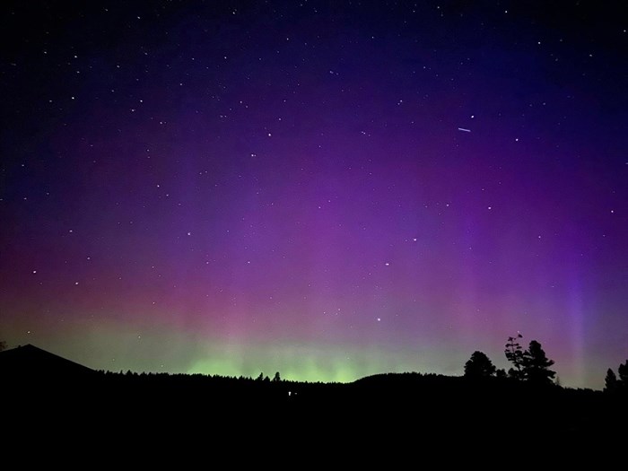 Purple and green aurora shines in skies over Princeton. 