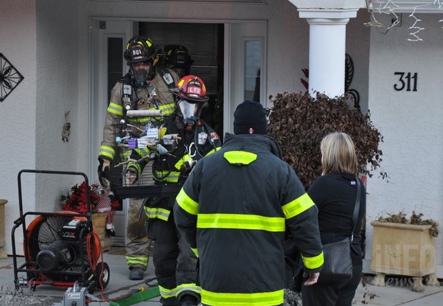 Kelowna firefighters rescued a caged budgie from the smoke inside the home on Woodpark Crescent, Monday, Dec. 15, 2014.