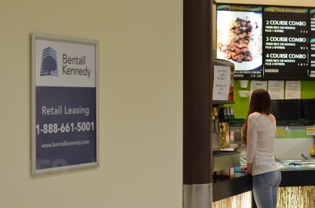 Vacant space in the food court, next to the Sizzling Wok. 