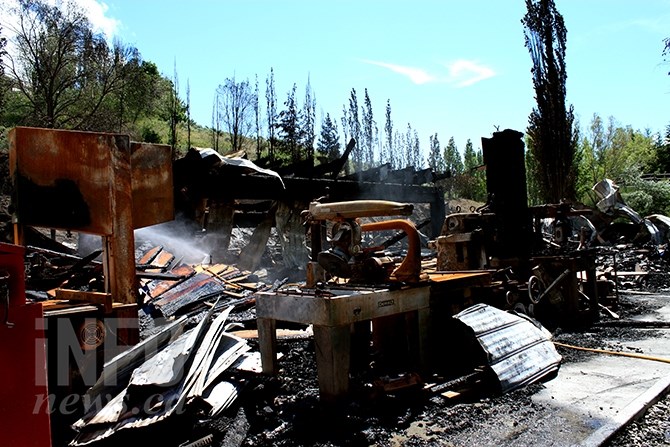 The shop of Plexus Woodworking was devastated by Sunday's fire. Owner Rick Grandbois said he had no plans to rebuild.