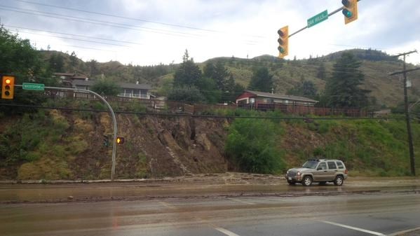 Water is pouring over roads and boulevards in Westsyde following heavy rains on June 30, 2015.