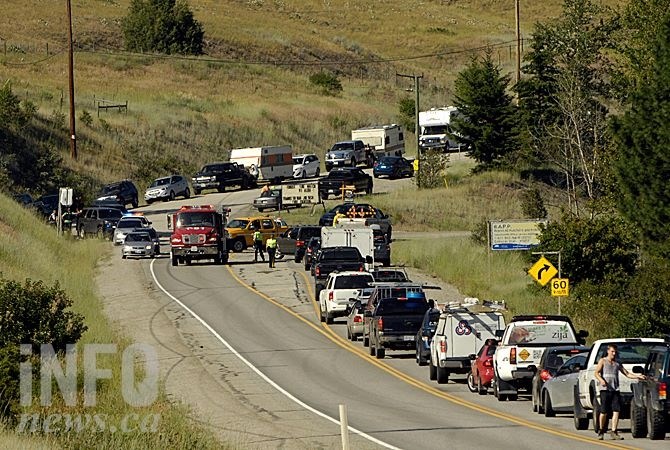 Traffic is closed on Highway 33in both directions at Black Mountain Road.