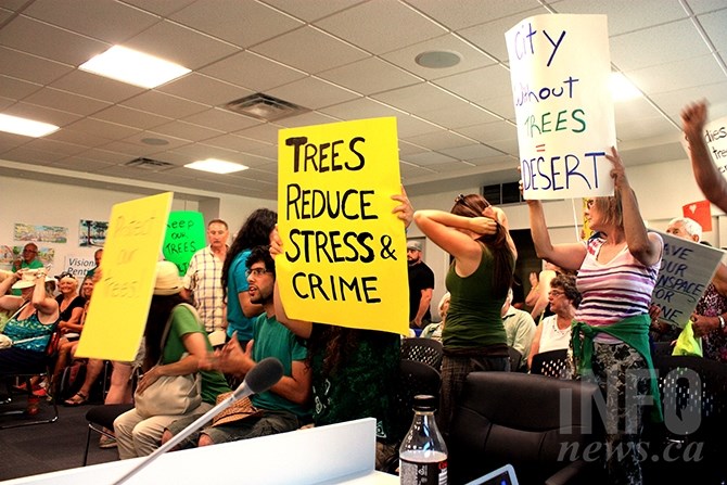 An unruly crowd formed in council chambers to protest a recent decison made by council to allow waterslides in Skaha Lake Park.