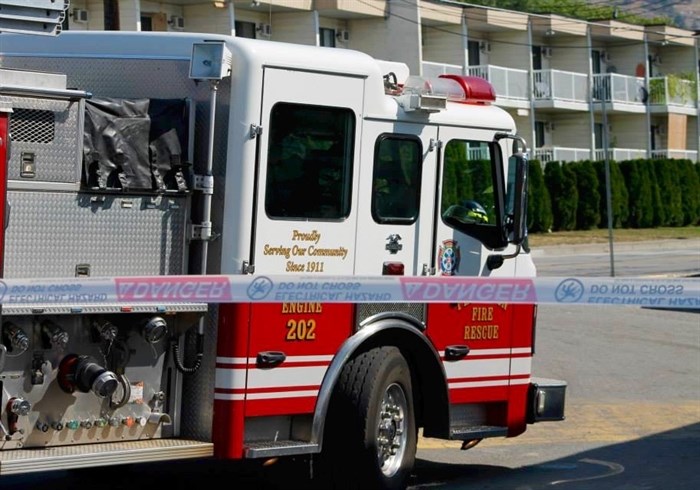 Penticton firefighters driving down the road saw the falling sign incident at the Husky station and stopped to help out, Sunday, Sept. 7, 2015.