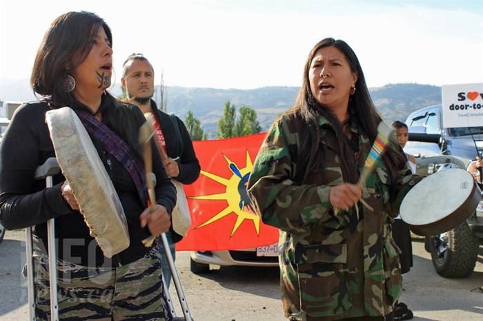 Protesters including First Nation groups, postal workers, students and Muslims waited outside the Horizon North Warehouse during a campaign stop by Prime Minister Stephen Harper.