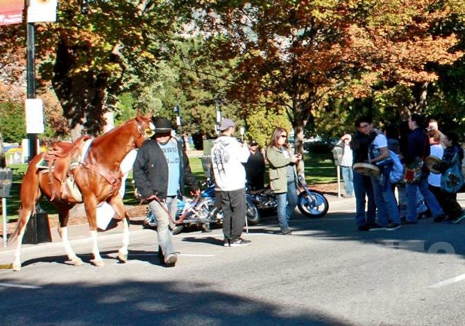 Protesters, including some on horseback, gathered in bigger numbers than usual outside the Penticton courthouse for an appearance by the co-accused in the Roxanne Louie murder case, Monday, Sept. 21, 2015.