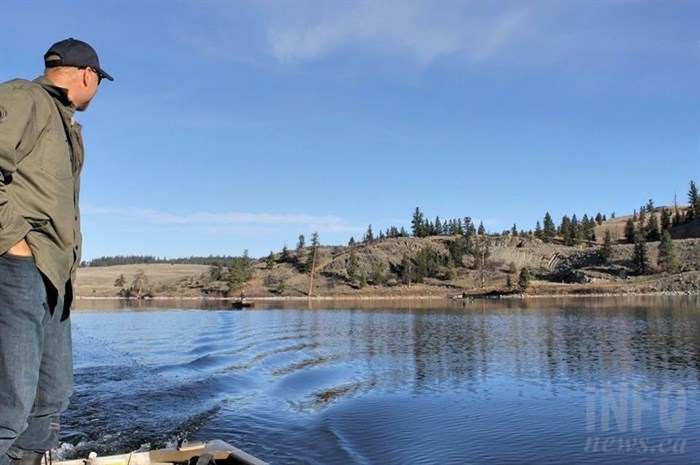 Fisheries biologist Steve Maricle looks at Mine Bay, an area well-known to local fishermen.