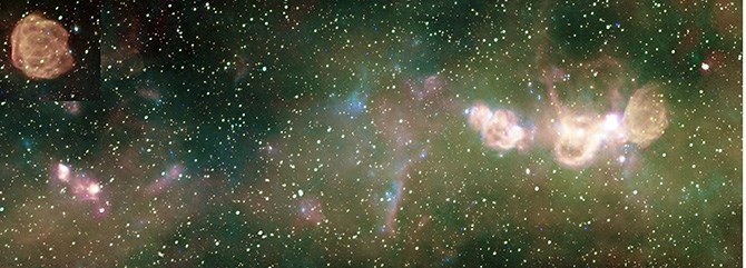 This is a radio image made during the Canadian Galactic Plane Survey. The primary instrument in the project was the DRAO Synthesis Radio Telescope.
In the top left corner is a 