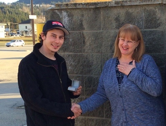 Jacob Starnyski presents the long-lost jewelry to Dani's mom, Donna. 