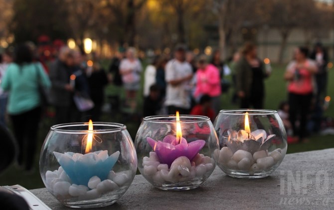 Candles burning at 10th anniversary vigil for Jessie Foster.