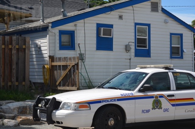 Police kept watch over Munton's house June 3, 2016. 