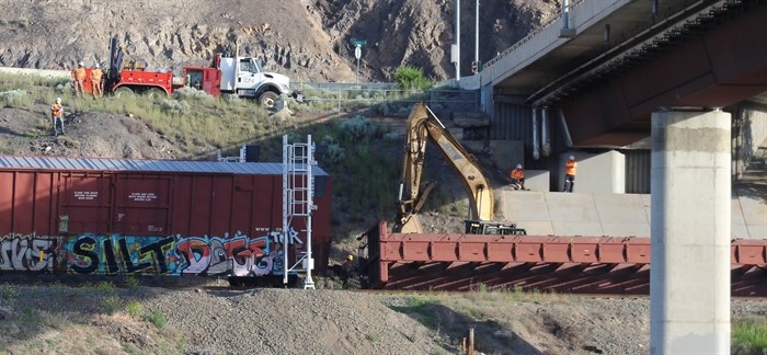 Crews work to clear the CN mainline through Ashcroft this morning, Monday, June 6, 2016.