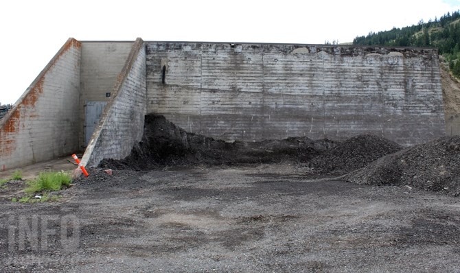 A smaller bunker. Normally covered by earth, this one has had its covering removed.