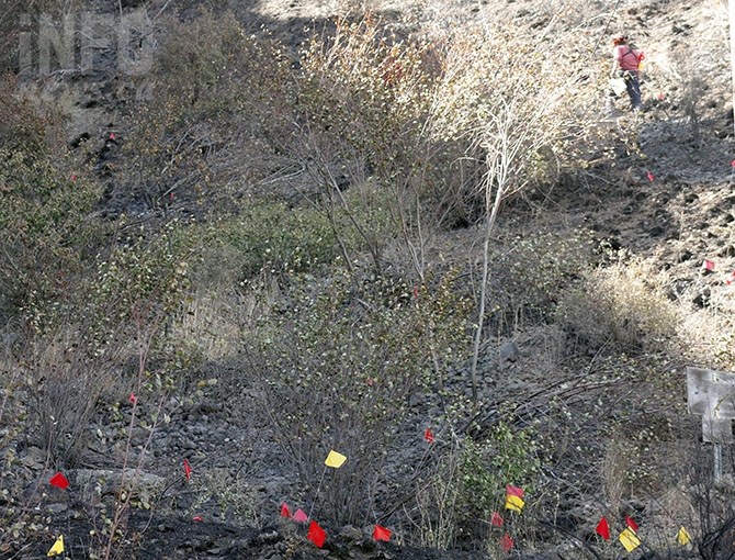 B.C. Wildfire Service fire investigators were working the Green Lake fire on Tuesday afternoon, Aug. 23, 2016.