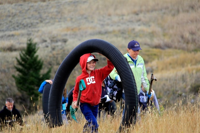 Volunteers of all ages were on hand to help build the burrowing owls homes on Oct. 15, 2016.