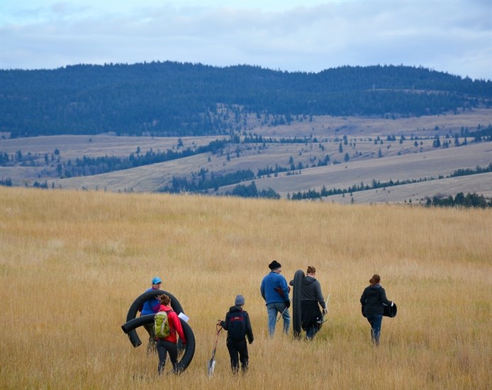 Shovels and tubes being carried to the site of a new owl housing development Oct. 15, 2016. The tubing is used for the tunnel from the hole's entrance to the owls' nesting area.