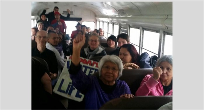 The bus filled up so quickly that organizer Jody Leon had to turn some people away. Other participants are following by vehicle in a caravan.	