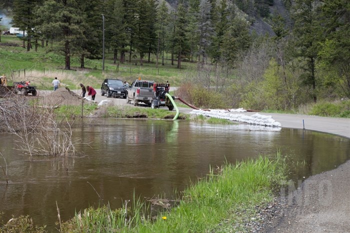 Locals and road maintenance workers can fill sandbags here on a corner of Campbell Creek Road. 