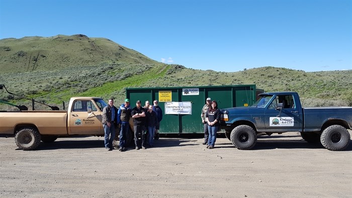 Volunteers nearly filled this 40 yard bin donated by Thompson Valley Disposal.