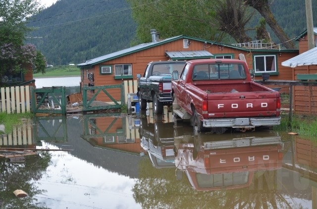 A property on Willow Shore Road is swamped with water May 24, 2017. 