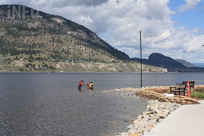 The Romp statue's subjects get some appropriate water wear as Okanagan Lake continues to rise June 2, 2017.