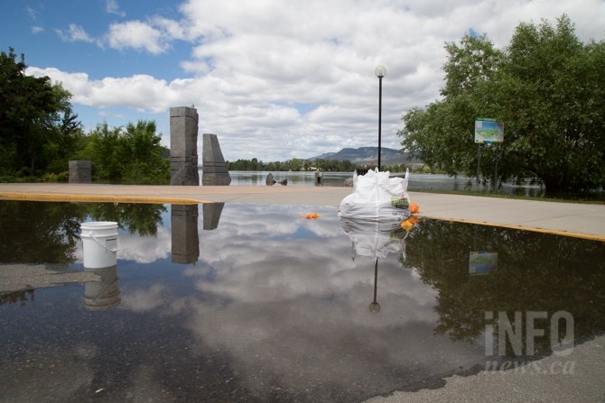 Crews have taped off areas and walkways at Riverside Park due to high water. 