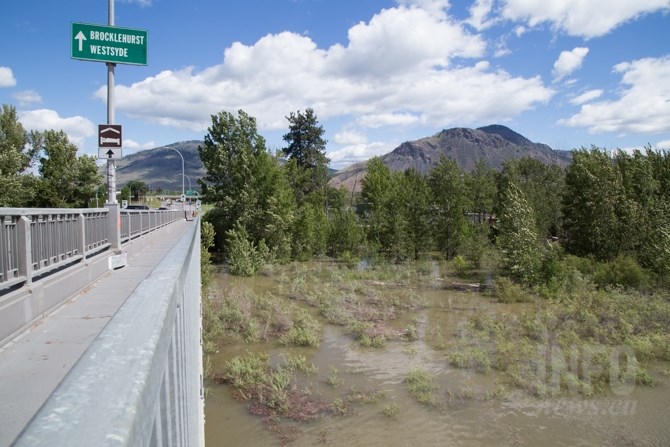 A view from the Overlanders Bridge shows water covering the sandbar near the Henry Grube Education Centre. 