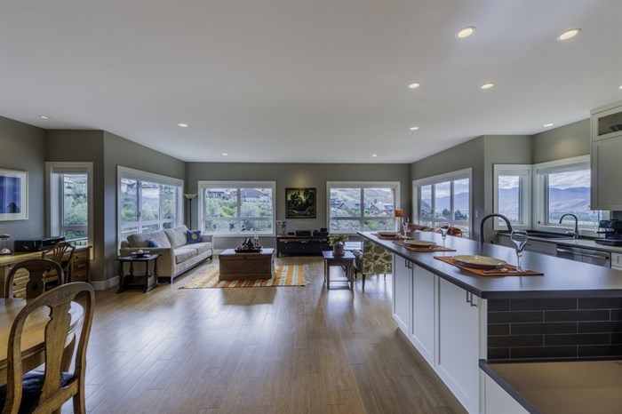 Open spaces and huge windows are the most striking features of the house.