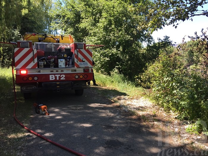 Kamloops Fire Rescue put out a grass fire in McArthur Island Park, Friday, June 23, 2017.