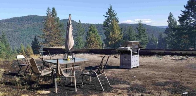 Some patio furniture is all that remains standing where Tobin Doyle Stuart's home used to be.