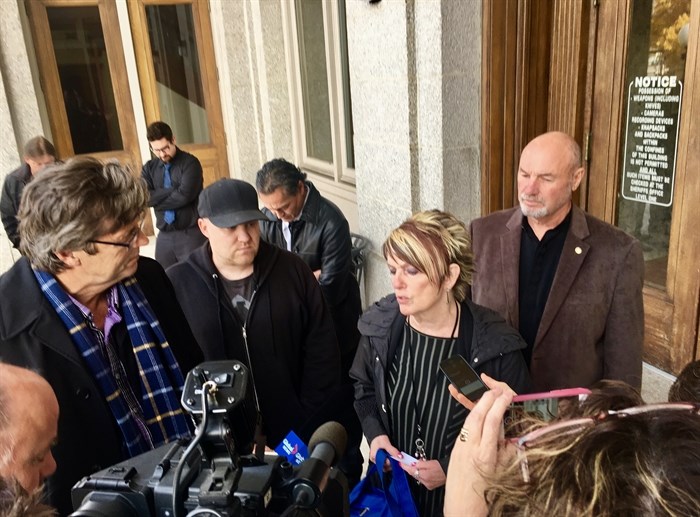 Jason's father John Hardy and step-mom Connie Allard speak to reporters Oct. 23, 2017. 