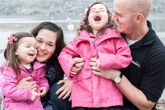 Jacob and Clara Forman are seen in a family photo posted to Facebook.