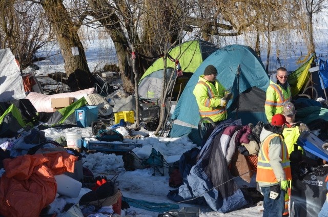 Contractors used trucks to haul items from the camp today, Jan. 18, 2018. 