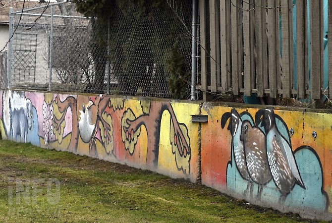 Wall art by Lars Widell in Duggan Park on Bernard Avenue.