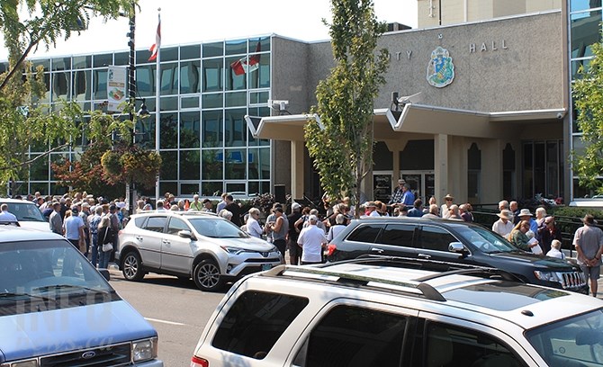 Approximately 100 enthusiastic supporters were on hand at Penticton City Hall this afternoon to hear former Councillor John Vassilaki announce his candidacy for mayor.