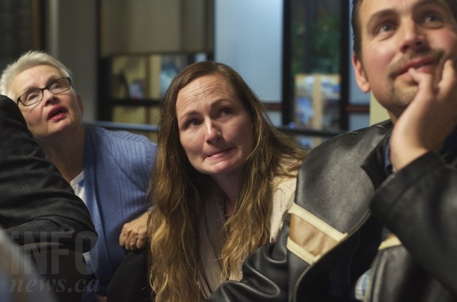 Kari Gares watches as the election results come in. 