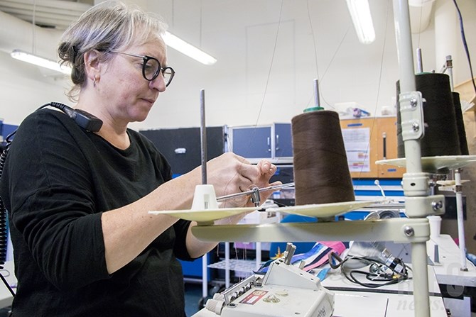 Costume workers travel around with the Cirque du Soleil performers. Every day they must make sure costumes are show-ready, that means laundry, repairs and polishing scuff marks off of shoes. Michele Deshaes normally works out of Montreal, but is replacing the full time worker who is off due to surgery. 