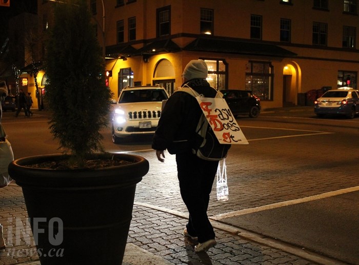 Dozens of people walked together through downtown Kamloops with candles and signs to show their support for National Addiction Awareness Week.