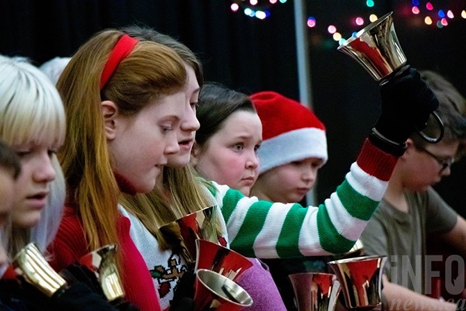 The KSA Handbell Choir practices 